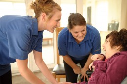 Alexandra and two carers